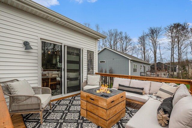 2537 Odawa Trl, Muskegon, MI 49444 - wooden terrace with an outdoor living space with a fire pit