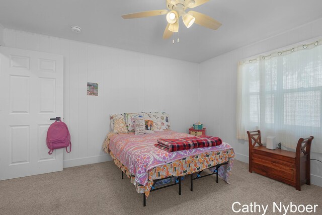 2233 Mills Ave, Muskegon, MI 49445 - carpeted bedroom featuring ceiling fan