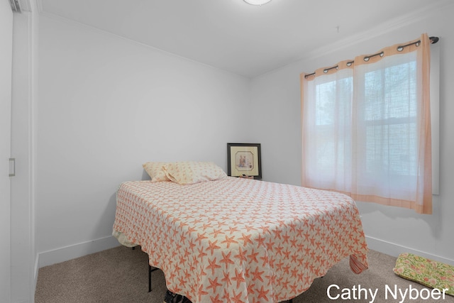 2233 Mills Ave, Muskegon, MI 49445 - bedroom with carpet floors, baseboards, and ornamental molding