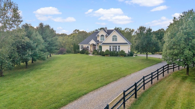 1280 Sylvan Rd, Chelsea, MI 48118 - view of front of property with fence, a chimney, and a front yard