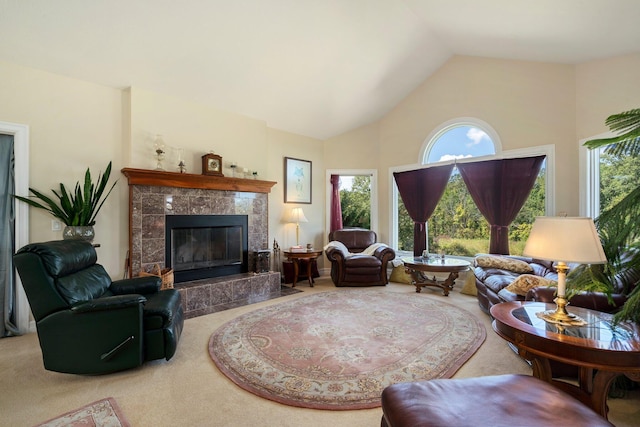 1280 Sylvan Rd, Chelsea, MI 48118 - living room with carpet, a tiled fireplace, high vaulted ceiling, and a healthy amount of sunlight