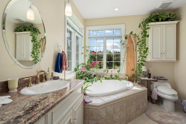 1280 Sylvan Rd, Chelsea, MI 48118 - full bathroom featuring tile patterned floors, a bath, vanity, toilet, and visible vents