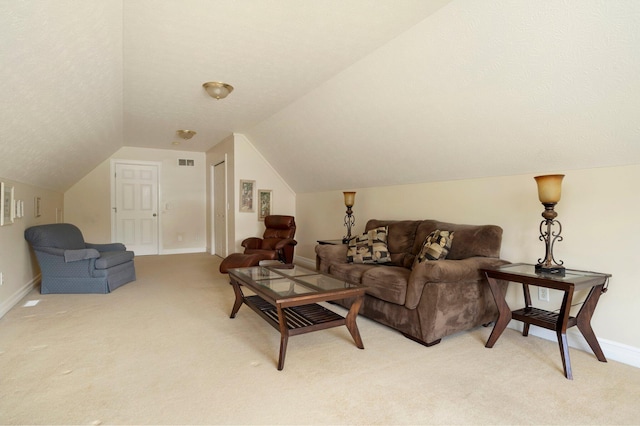 1280 Sylvan Rd, Chelsea, MI 48118 - living area featuring visible vents, vaulted ceiling, baseboards, and light colored carpet
