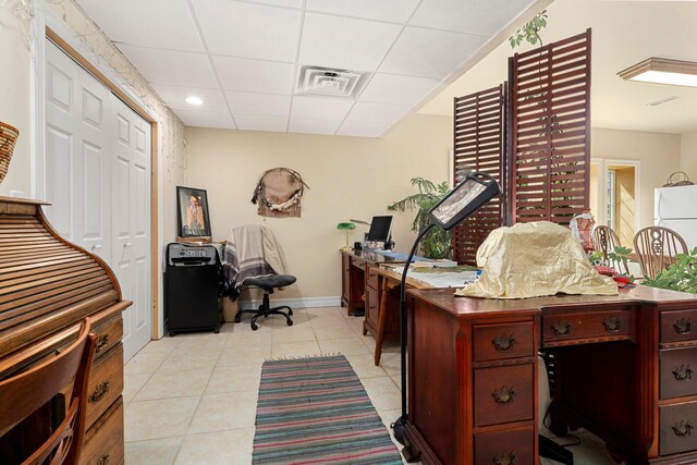 1280 Sylvan Rd, Chelsea, MI 48118 - office with baseboards, visible vents, light tile patterned floors, and a drop ceiling