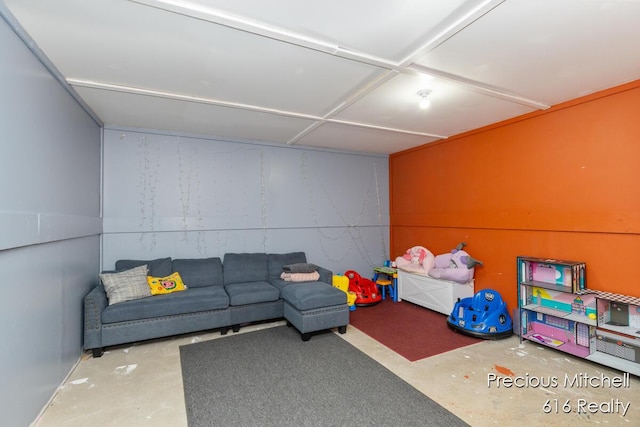 playroom with unfinished concrete floors