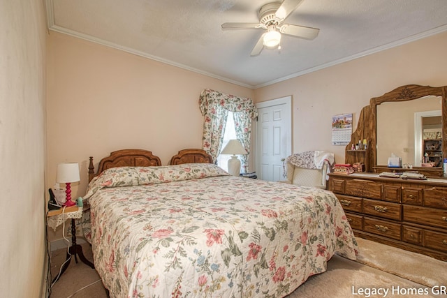 bedroom featuring crown molding, ceiling fan, and light carpet