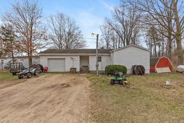 16788 David Ct, Mecosta, MI 49332 - view of front of property featuring a garage and driveway