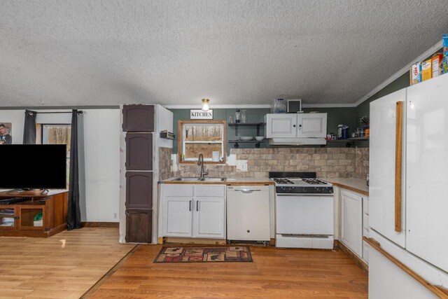 16788 David Ct, Mecosta, MI 49332 - kitchen featuring open shelves, white appliances, a sink, and a textured ceiling