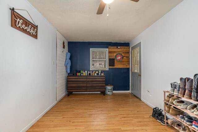 16788 David Ct, Mecosta, MI 49332 - corridor with baseboards and wood finished floors