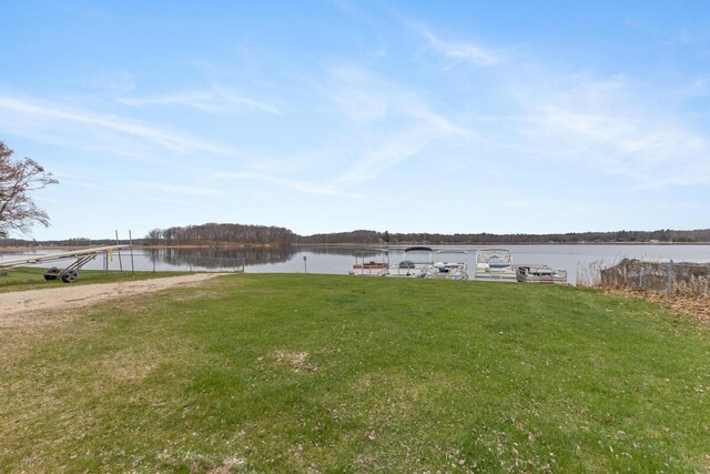 16788 David Ct, Mecosta, MI 49332 - view of yard with a water view and a boat dock