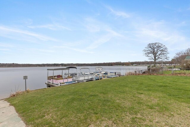 16788 David Ct, Mecosta, MI 49332 - view of dock featuring a yard and a water view