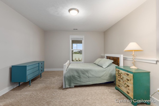 11325 Wake Dr, Allendale, MI 49401 - bedroom featuring baseboards, visible vents, and carpet