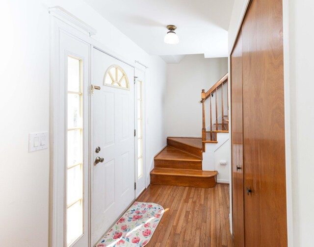 3126 Fairhaven Ct, Ann Arbor, MI 48105 - entryway featuring stairs and wood finished floors
