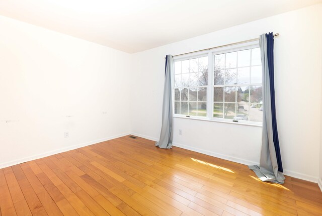 3126 Fairhaven Ct, Ann Arbor, MI 48105 - unfurnished room with light wood-style floors and baseboards