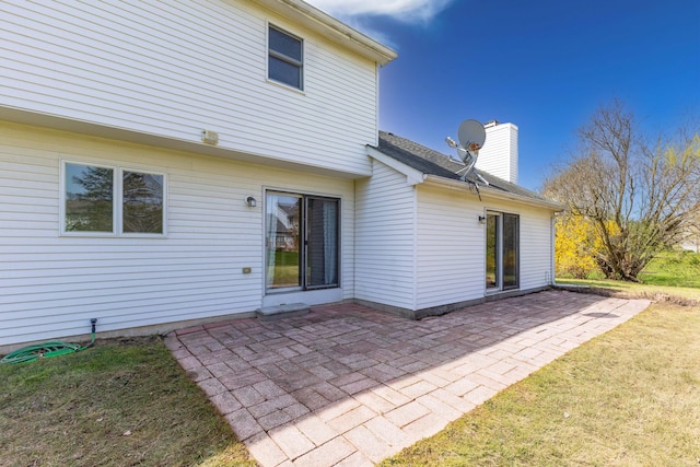 3126 Fairhaven Ct, Ann Arbor, MI 48105 - back of house featuring a patio area, a yard, and a chimney