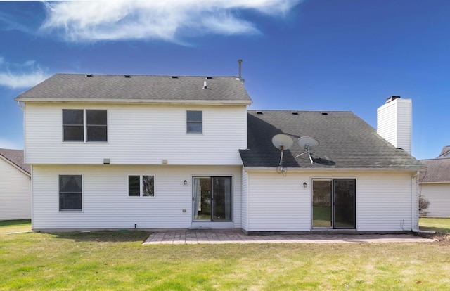3126 Fairhaven Ct, Ann Arbor, MI 48105 - rear view of house featuring a lawn, a shingled roof, a chimney, and a patio