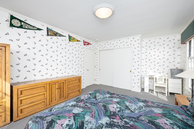 1060 Chestnut St, Ann Arbor, MI 48104 - carpeted bedroom with crown molding, a closet, and wallpapered walls