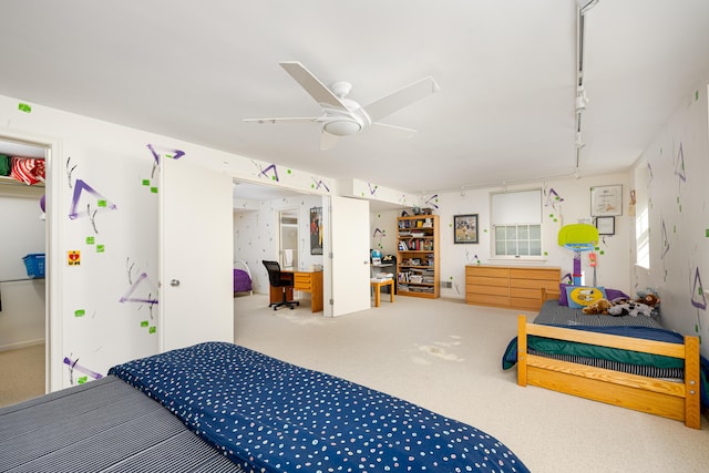 1060 Chestnut St, Ann Arbor, MI 48104 - carpeted bedroom with a ceiling fan and track lighting