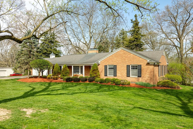 1060 Chestnut St, Ann Arbor, MI 48104 - ranch-style house with a front yard, roof with shingles, a chimney, and brick siding