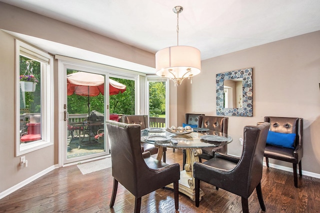 5591 E Grove Dr SE, Grand Rapids, MI 49512 - dining room with healthy amount of natural light and wood finished floors