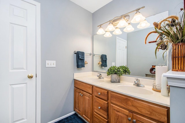 5591 E Grove Dr SE, Grand Rapids, MI 49512 - bathroom featuring double vanity