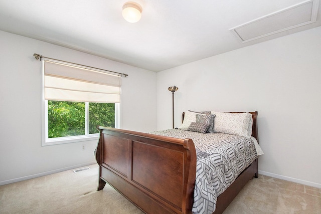 5591 E Grove Dr SE, Grand Rapids, MI 49512 - bedroom with light carpet and attic access