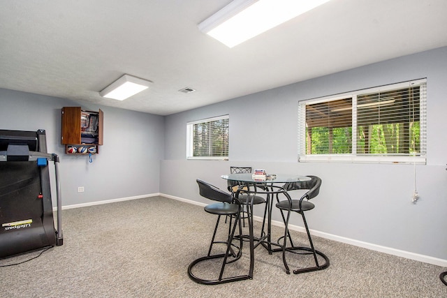 5591 E Grove Dr SE, Grand Rapids, MI 49512 - dining area featuring carpet floors