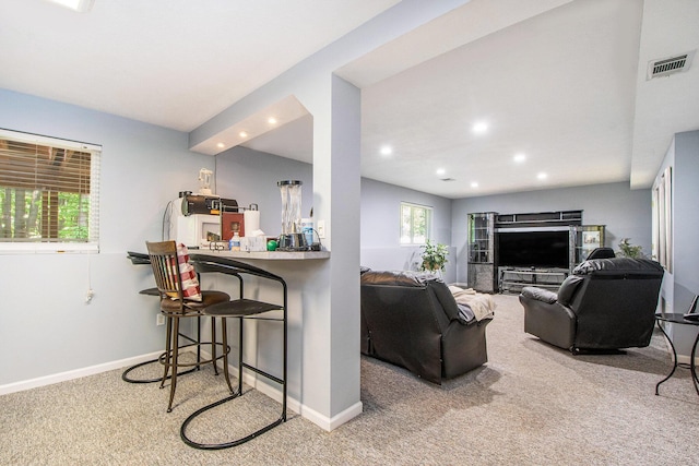 5591 E Grove Dr SE, Grand Rapids, MI 49512 - living room featuring carpet and recessed lighting
