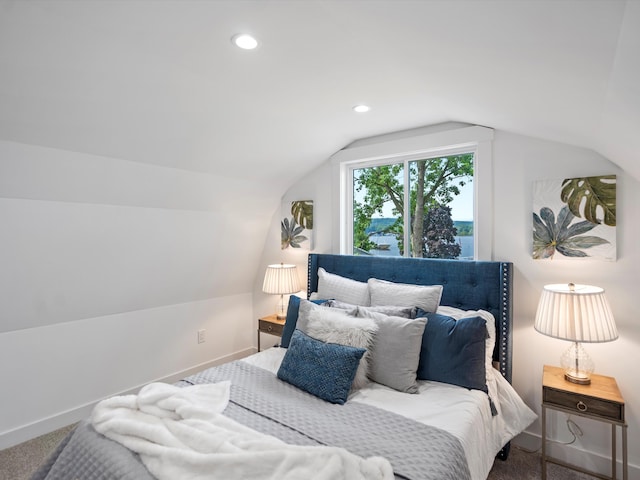 carpeted bedroom with baseboards, recessed lighting, and vaulted ceiling