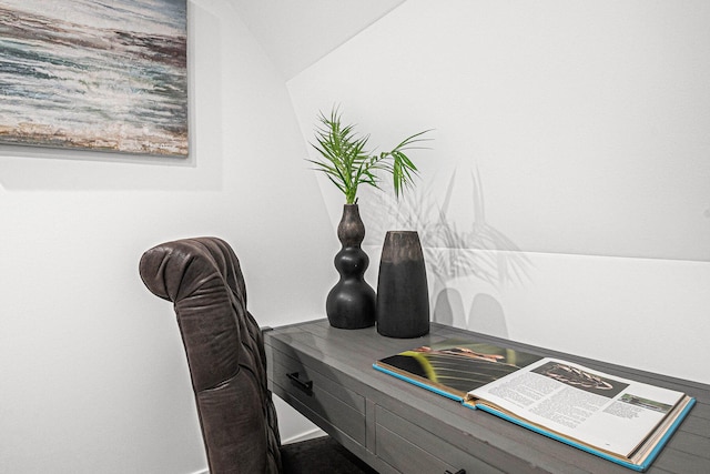 office space with vaulted ceiling