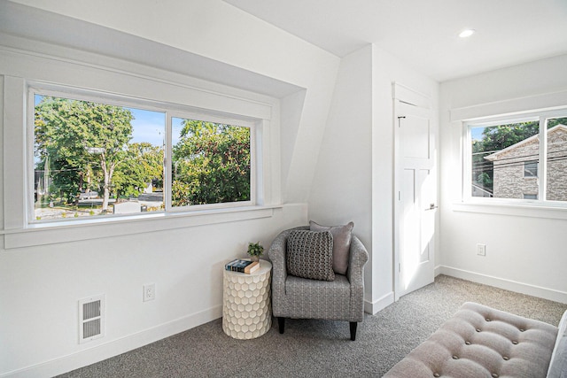 living area featuring recessed lighting, baseboards, carpet floors, and plenty of natural light