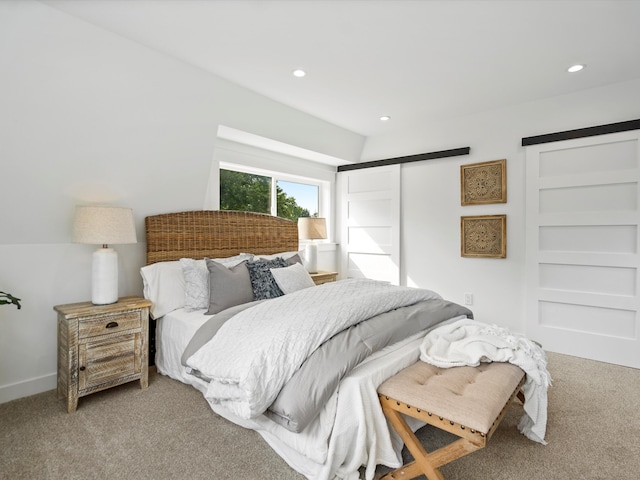 bedroom with recessed lighting and carpet floors