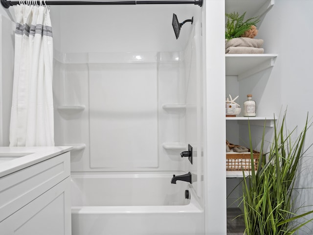 full bathroom featuring shower / bath combination with curtain and vanity