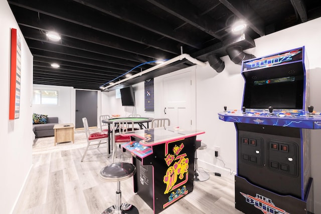 playroom featuring wood finished floors
