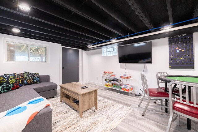 living area with wood finished floors