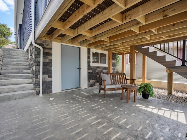 view of patio / terrace featuring stairway