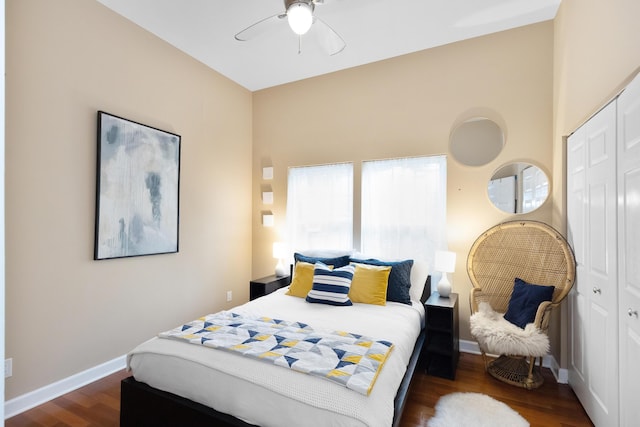221 N Townsend St, New Buffalo, MI 49117 - bedroom featuring wood finished floors, a closet, baseboards, and a ceiling fan