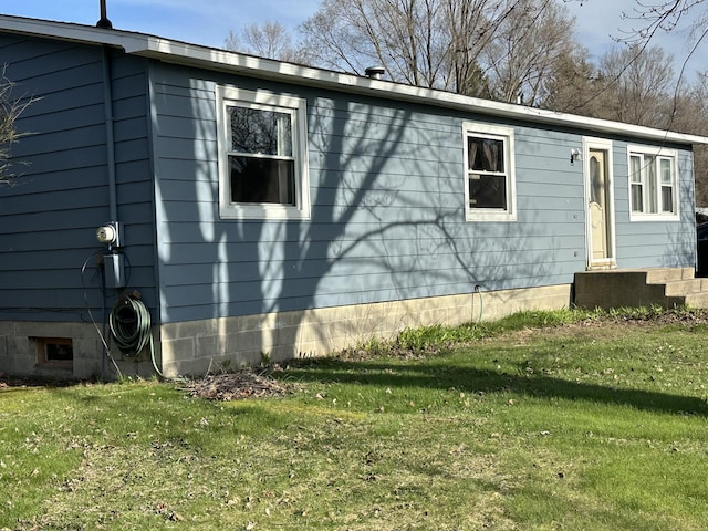 2080 N Mears St, Mears, MI 49436 - view of side of property with a lawn