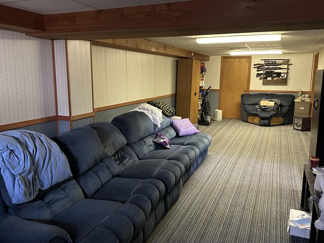 2080 N Mears St, Mears, MI 49436 - living area featuring a wainscoted wall, carpet flooring, and wallpapered walls