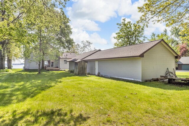 150 Hyde Rd, Clarklake, MI 49234 - back of property featuring a yard and roof with shingles