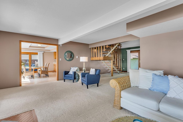 150 Hyde Rd, Clarklake, MI 49234 - carpeted living room featuring stairs, plenty of natural light, and beamed ceiling