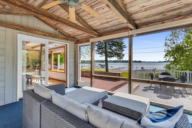150 Hyde Rd, Clarklake, MI 49234 - sunroom with a water view, a ceiling fan, and an outdoor hangout area