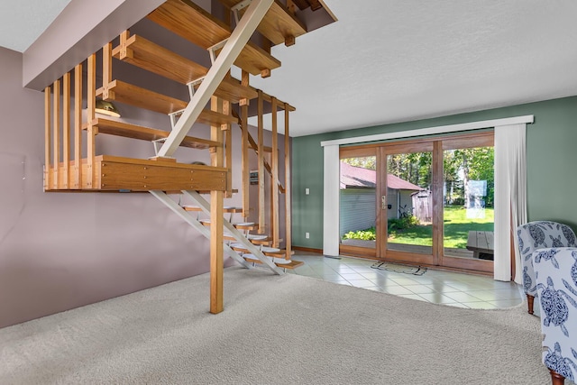 150 Hyde Rd, Clarklake, MI 49234 - carpeted bedroom with access to exterior and tile patterned floors