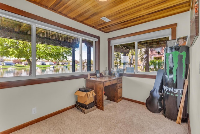 interior space with wooden ceiling, a water view, baseboards, and carpet flooring