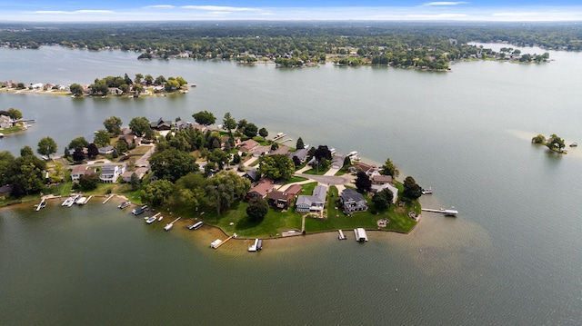 aerial view with a residential view and a water view