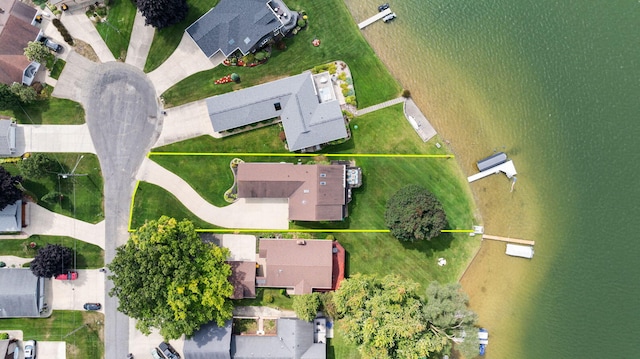 birds eye view of property with a residential view
