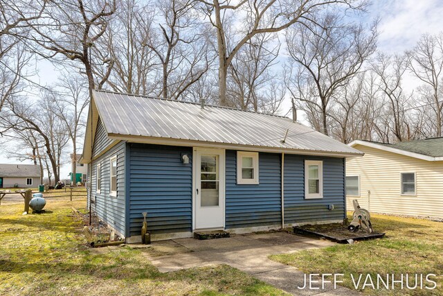 7848 W Minising Point Dr, Baldwin, MI 49304 - exterior space with metal roof
