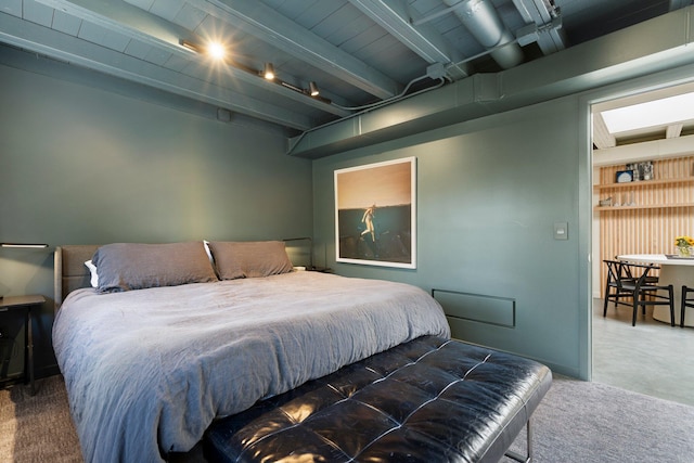 bedroom featuring beamed ceiling