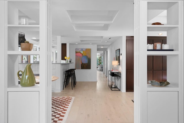 interior space featuring wood-type flooring and a healthy amount of sunlight