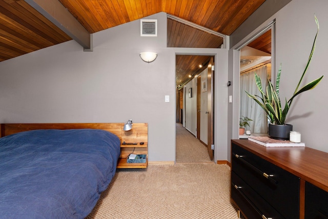 bedroom featuring visible vents, carpet, vaulted ceiling, and wooden ceiling
